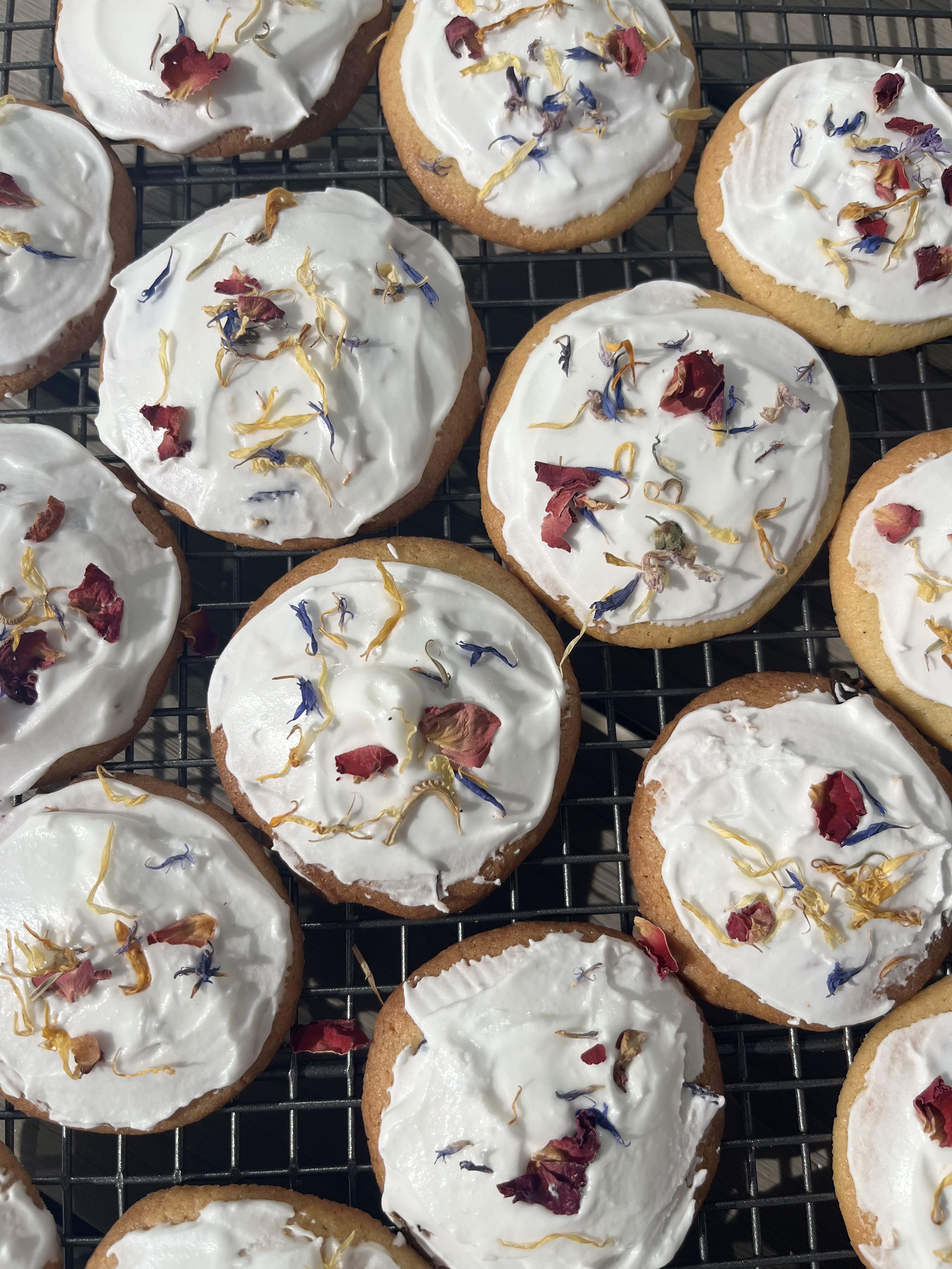 Iced cookies with edible flowers